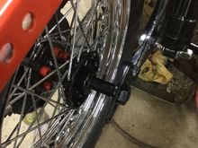 Flange is to the swingarm right now. Correct?