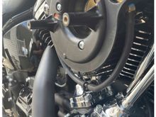 I did the same thing and plugged the holes with high temp silicone and vented with filter below the front tube.