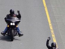 On Hwy 401 (taken from one of the overpasses)...I was impressed at how many people turned out on these to wave as the ride rolled on...personalized the return of our fallen (including some of the wife's friends who fell)