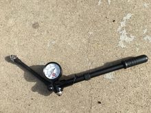 Shock pump. Paint is worn from riding in bag on trips. $25.00