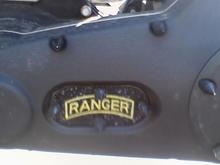 This is a free hand airbrush job of a Ranger tab, I had done on my inspection cover.