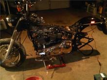 Fatboy torn down. All this because my brake light stopped working. SHEESH!