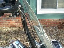 There is an inch gab between bars and windshield.