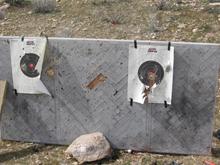 Our table top backstop after about 700 rounds or so. We were surprised how well it stood up to so much torture. It took a beating from our .357, .50AE, .450 Marlin (from the BFR and rifle), .444 Marlin, .38 SPL, 9mm, .22LR, 30-30, 30-06, 308, .30 Carbine and a 12 gauge. We named this trip ATF weekend. Alcohol, tobacco and firearms required.