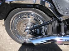 chrome Fatboy wheel and chrome axle bolt cover with polished rotor