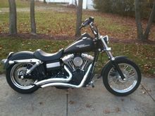 Right side solo riding setup; has 2" tank lift; lowered in rear; V&amp;H Big Shots pipes &amp; Ness Big Sucker air clearner setup; Chrome forward controls with HD Black Diamond break pedal &amp; peg