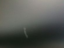 Slight imperfection. Small scuff mark on top right of gas tank where a tool slipped &amp; fell. Not gouged or dented in any way - just scuffed.