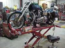 Harbor Freight lift modifyed
was on sale $399.00 20% off 1200lb air lift
5" chanel added to front for wide glide
tab for jiffy stand