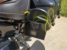 Easily accessed while still straddleing the bike.