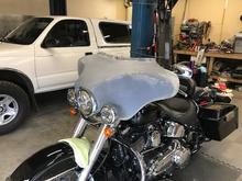 Finalized the modifications to the fairing and the brackets. Too it over to my buddies for paint. 