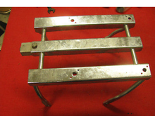 Can that extension piece be taken out and be placed on another luggage rack? Is it impossible to take that out or is it only being held together only with a nut? 