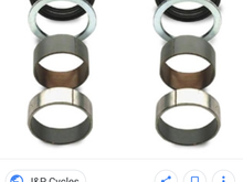 You can see the wear items that look like copper or brass coloured items that wear during jounce, and get replaced during rebuild or chrome fitments
