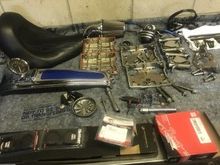 I MEAN the guys great, all my stuff laid out, today someone, was HAND CLEANING all the oil etc, off parts, and putting light coat of oil on, and preserving till build comes in!!!, and YES those are some parts in front, all parts in photos are for this bike, this area is the Rocker C Build...lol
