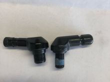 The Valve on the right is a cheap-o from amazon (11.3 mm) and the one on the right is the TPMS valve. If you look at the the base that goes into the rim, they're basically the same size.