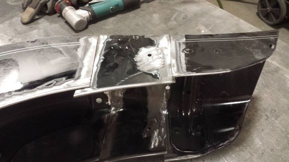 A close up of the skirts fitted inside the stock fender from the donor fender