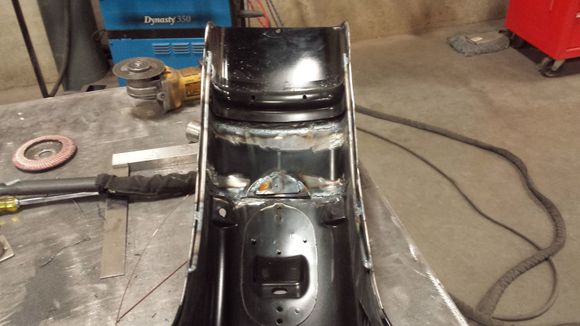 Formed and added in some 1/4" round stock for bracing on the inside of the fender. This should give it plenty of rigidity.