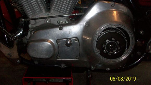 Primary gasket / primary back on. Be careful where the longer screws go! On my primary cover it was the one to the left of the drain plug, the one directly above that one, and the one closed to the top swing arm cover; in a triangle pattern.