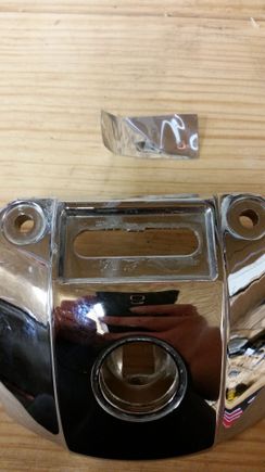 The little plate is just glued on and pops right off.