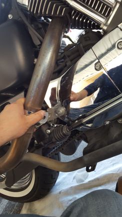 So i have another problem! Im trying to reinstall the pipes. The pipe bracket clamp will not fit from the sprocket guard entension to the pipe. I cant get the damn thing to fit. The pipe is to far away from the sprocket cover