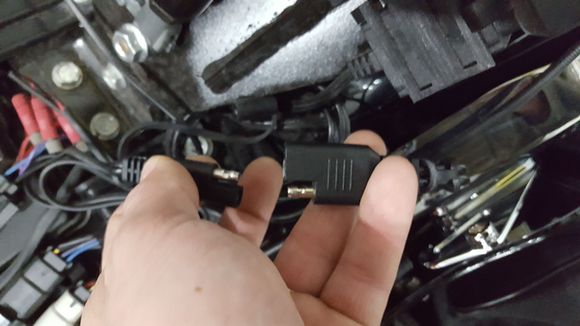 Battery tender is obviously not in use while on the bike. I simply pull the pigtail over the subframe, and plug it into the usb pigtail.