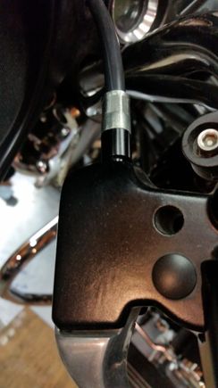 The black piece between the perch and the cable ferrule is black anodized aluminum. It's not plastic, although it wouldn't bother me if it was. It's in compression, can't imagine it breaking.