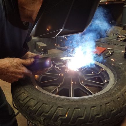 Weld disc inside of race and knock out from back side with drift.