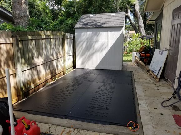 Existing shed relocated and the new Shed floor laid.