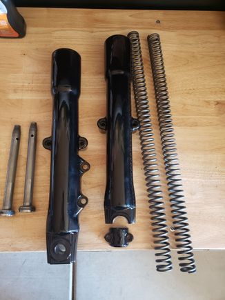 Axle fits 08 and up.  Genuine Harley gloss black sliders and not a single scratch on them! Spings and dampeners included.  150 shipped
