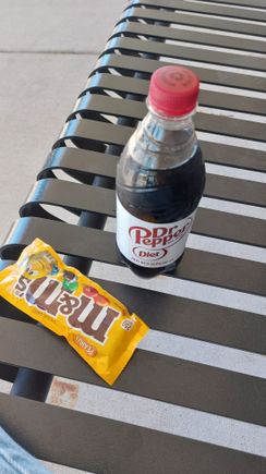 I ran across to that Casey's and grabbed a snack, and enjoyed it on the front porch of the dealership. 