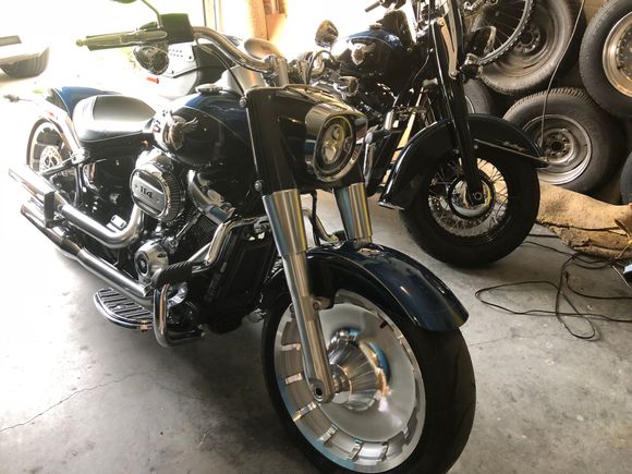 I had the same problem, so I decided to try both.  I have about 1000 miles on each bike, a little more on the Heritage, since the wife rides it when she rides. I prefer the Heritage overall.  It is a long term keeper for me.  I will wait to see what next year brings and test that Harley guaranteed trade in value with the Fatboy if something new really grabs my attention.