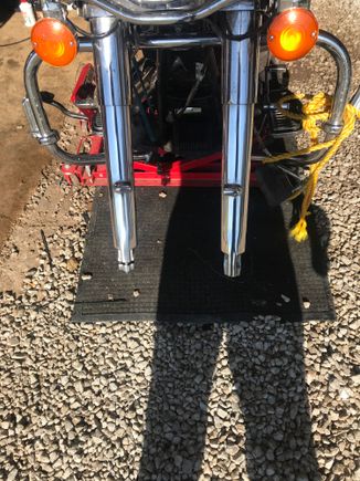 6 year old thread but here is what i did on my buddies Road King. I used 3m headlight restorer and then used mothers on it. Turned out really good as you can compare the one fork that is not done to the other that is in first picture 