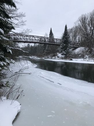 Snowmobile bridge over the Manistee river.
