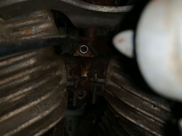 So this one didn’t come off with the bolt part stuck to the nut only the nut came off. Now it will wiggle a little bit from the bottom (where the whole deal came out) but the top doesn’t move at all. Should it be able to just slide off the bolt or is the bolt part supposed to come out too? 