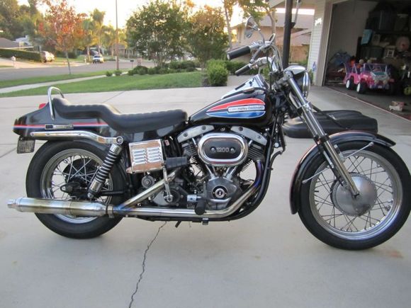 This isn't the exact bike but I bought one just like it back in 1974. 1972 FX Night Train. Paid $1,500! 