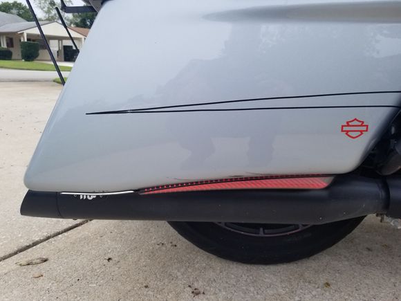 Under extended saddlbag Run-Turn-Brake lights.  Almost invisible when not lit, but again provides easily seen good side lighting.  I think the design is just absolutely beautiful.   