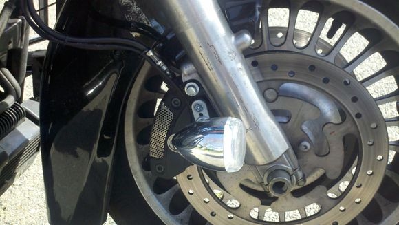 "New" driving lights on the Road Glide.  I used old Dyna Turn Signals and put 6w LED bulbs in them.