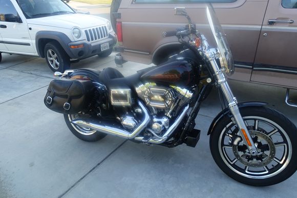 Lots of mods over the winter, but I think I'm almost done...lol
HD Daymaker, Joker mirrors,Saddlemen seat,Race Tech God Valves,Ohlins Blackline shocks,30/68 pulleys,Baker Timkem main drive kit, Jim's trap door,AIM VPC,Predator mount, SE CNC heads,S&S 110",SE 50mm TB,SE-259 cam, Rocker lockers,Axtel oil bypass, Red Shift tensioners, Ultra Cool,R&B LSR 2-1, TTS, Baker Attitide tensioner..Lot's more little stuff.
