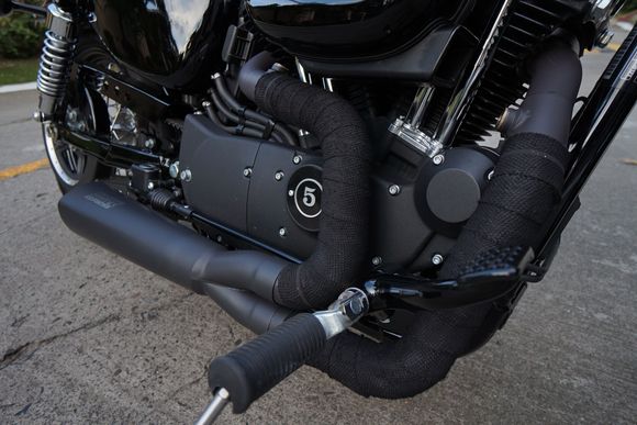 Vance and Hines Competition Series 2 into 1 exhaust with Thermal wrap.