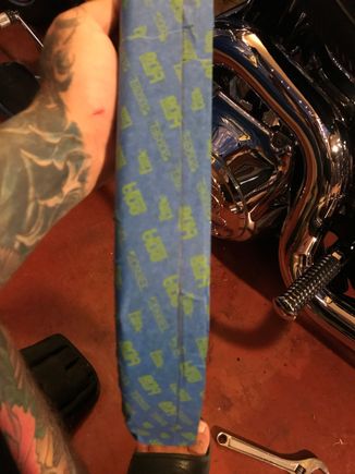 He eventually stopped returning my calls, leaving me to figure things out on my own.  I decided the cheapest route was to cut the guard.  It was scratched so screwing it up wasn’t a concern. 