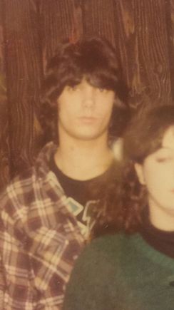 Everybody had long hair in the eighties no? Me after a fresh haircut. Notice ac/ dc shirt under the flannel, way before grunge took off. You never slow down, you never grow old. Keep riding!