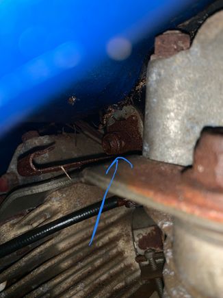Went out and sprayed some more wd-40 and tried to get the other spark plug out but the socket doesn’t fit between it and the gas tank. Problem is I haven’t figured out how to get to that nut to hold it from turning to get the tank off. 