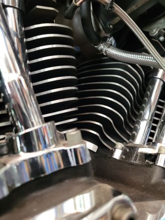 smaller line is oil pressure they meet up and head our together