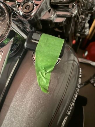 I tape mine to the gas cap, I can keep track of both..