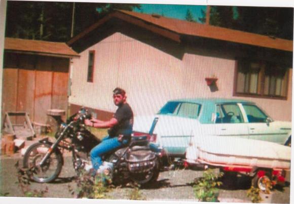 1984 FXST with a trailer I made. I could haul a ton of shit with it. Rode the hell out that bike and to this day, I kick myself in the ass for letting it go. It took me to Sturgis and back in 1987 and never missed a beat. 