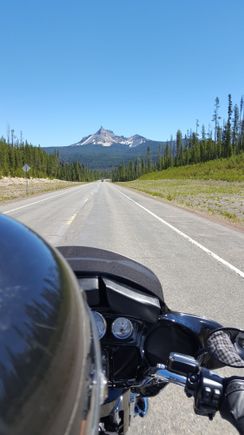 OK can't say it shows much about my windshield height (9") but I think it's kind of a cool shot (taken by wife).  Mt. Thielsen, Southern Oregon headed to Montana 2016.
