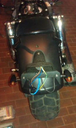 Lucas tail light bracket and turn signals are on.