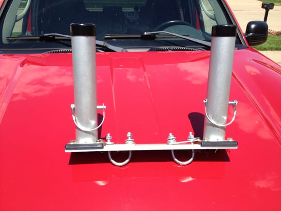 The U bolts attach the mount to the bars on the luggage rack.