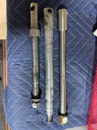 Stock FXD axle on left, Stock 49mm axle in middle, and the Vulcan conversion axle on the right. Definitely going to need some spacers. 