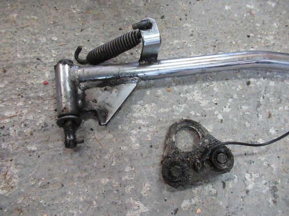 Last two pieces removed.  I have a new horn.  The kickstand pin is shot.