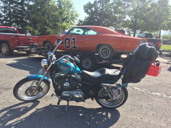 Wow! 
Here I am just using a ratchet strap and a 1gallon can